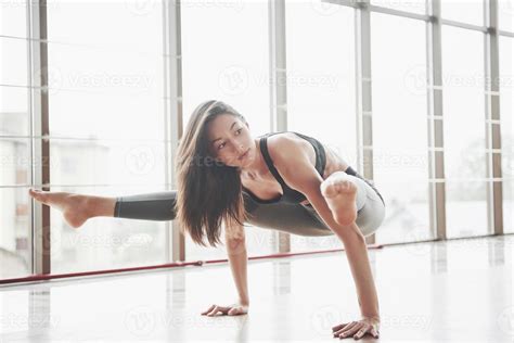A Sports Girl Who Cuts The Torso And Makes A Stretch A Woman Tries To Be In Good Shape