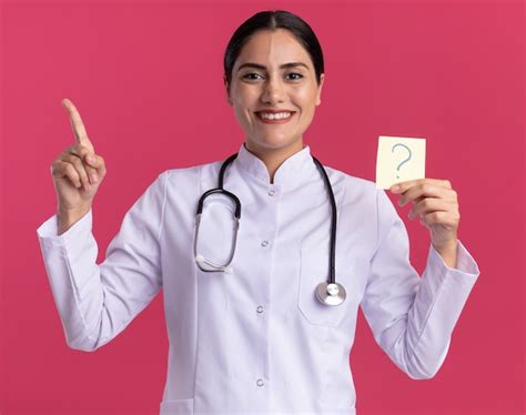 Free Photo Happy Young Woman Doctor In Medical Coat With Stethoscope