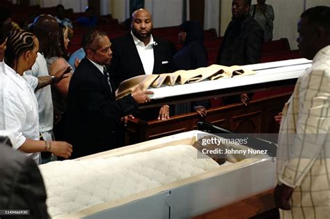 The Lid Of The Casket Is Lifted During The Funeral Of Frank Lucas At