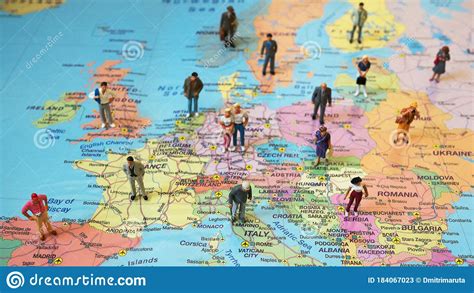Many Figures Of People Are Placed On Europe Map Stock Image Image Of