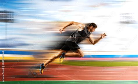 Man Running On The Athletic Track Stock Photo Adobe Stock