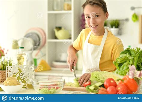 Portrait Of Boy Preparing Cooking At Home Stock Photo - Image of diet, salad: 160214836