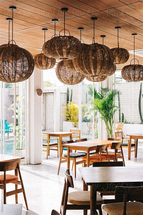 Tropical Interior Design Hip Empty Restaurant In Stylish Beach Club By Stocksy Contributor