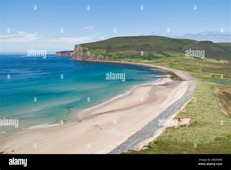Elevated View Of Sandy Beach And Cliffs At Rackwick Bay From
