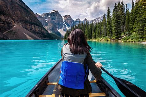 Tourist Canoeing On Moraine Lake Banff National Park Alberta Canada