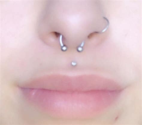 septum piercing crooked or swelling i got my septum pierced yesterday i took this picture