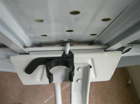 If one of these components is broken or damaged, the ironing board if the spring that holds the rod in place is broken or damaged, you will not be able to repair it. Cybernetic Musings: Fixing the ironing board