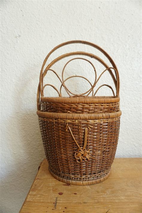 You can also use wicker furniture and lampshades to match the look. Vintage Dark Brown Bamboo Rattan Wicker Wall Basket