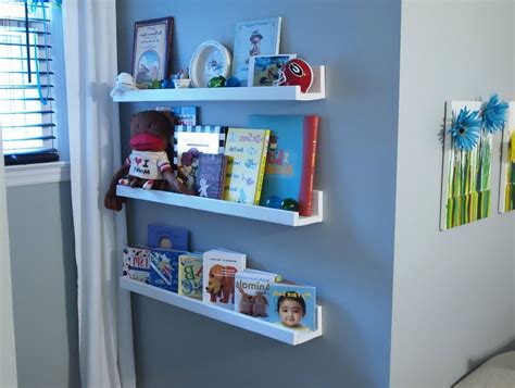 When designing our little one's nursery room, i knew i wanted to create a diy kids bookshelf for the wall as part of a reading nook. Image result for kids wall book shelves (With images ...