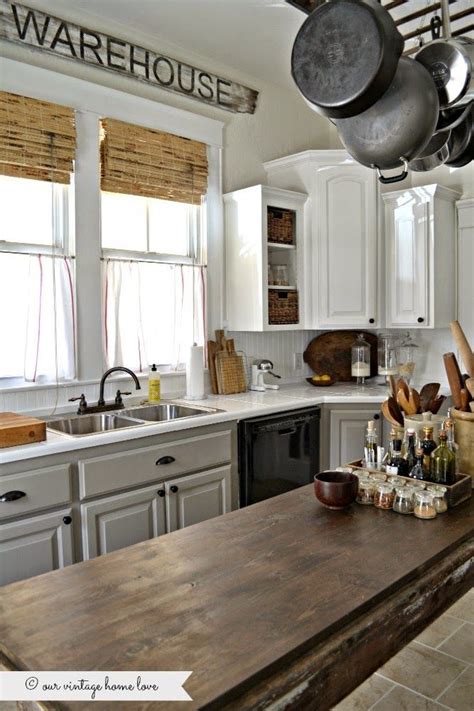 Farmhouse table and bench set, gray base, provincial stain. painted kitchen cabinets white uppers and gray lowers with ...