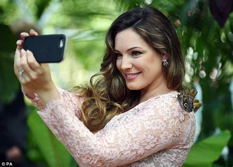 A Butterfly Lands On Kelly Brook S Face At The Hampton Court Flower