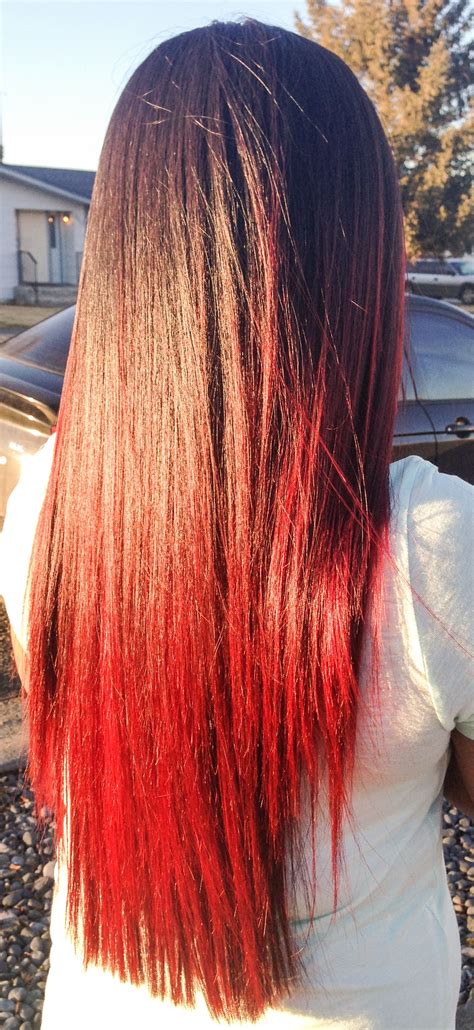 The dye has oxidized (rusted) and attached itself to your hair. Brown hair with red tips | Red hair tips, Brown hair red ...