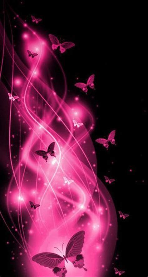 Pink Butterflies Are Flying In The Air With Light Streaks On Their Body
