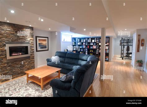 Luxury Basement Living Room With Gas Fireplace Stock Photo Alamy