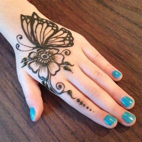 Henna tattoo hand henna tattoo muster simple henna tattoo henna body art. Back hand butterfly mehndi pattern with flower starting on ...