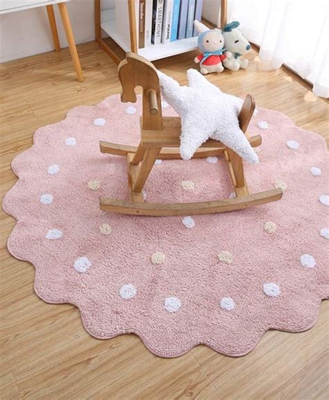 This whimsical and beautiful machine woven rug. Cute round polka dot rug for children's bedroom or nursery ...