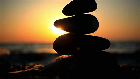 Stones Pyramid On Beach Symbolizing Zen Harmony Balance Sea At