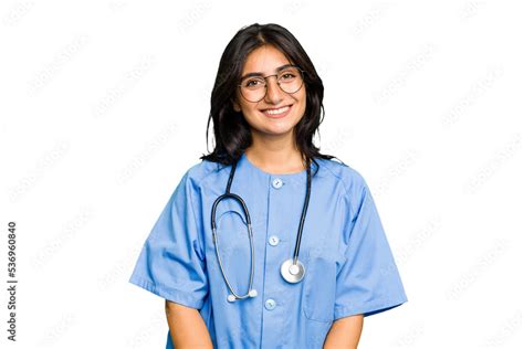 Young Nurse Indian Woman Isolated Happy Smiling And Cheerful Stock