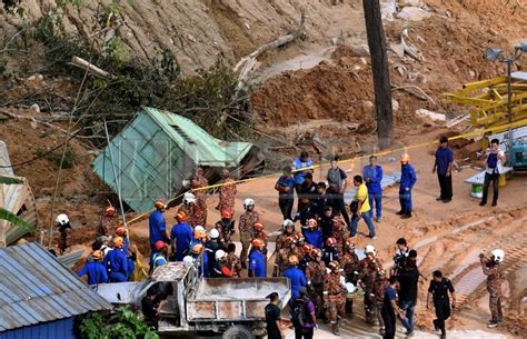 three more bodies pulled from penang landslide rubble death toll stands at seven new straits
