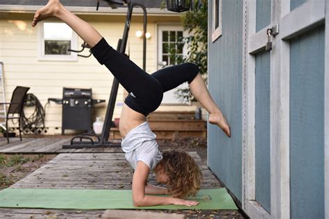 How To Yoga Scorpion Handstand Vrschikasana By Courtney Bell