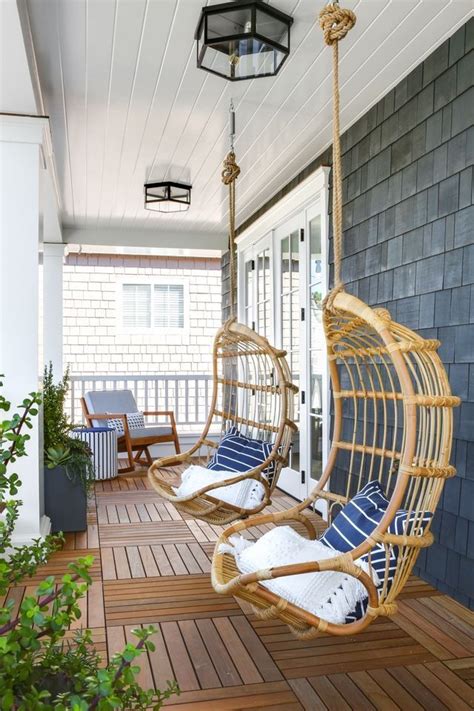 10 easy pieces rattan hanging chairs gardenista. Porch Hanging Chairs Beautiful front porch with Porch ...