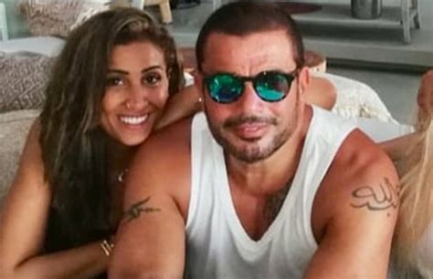 أثارت أنباء ارتباط الفنان عمرو دياب بمصوّرة مجلة vogue الشهيرة دينا بهجت حالة من الجدل الشديد، وذلك عبر مواقع التواصل الاجتماعي، ممن تداولوا صوراً تجمع بينهما في أكثر من. عمرو دياب لدينا الشربيني: والله بحبك موت | فيديو - بوابة ...