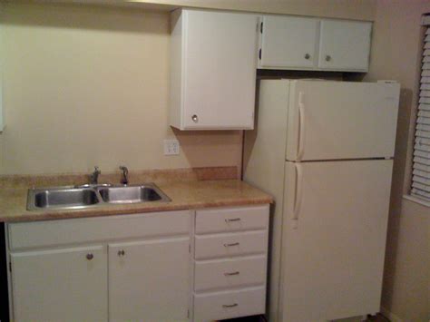 13 ways to makeover dated kitchen cabinets without replacing them. Showroom Construction