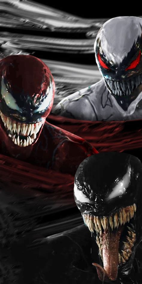 Download Venom And Carnage Clash In A Chaotic Showdown Wallpaper