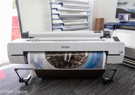 As the paper relocates via the p20000's rollers, a cmos optical sensing unit tracks its movement. Epson SC-P20000 printer review. 64 inch width large format printer