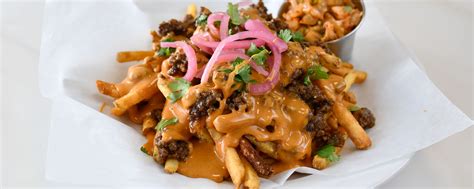 This might be the biggest food challenge yet. Cheesy Loaded Fries Recipes | Land O'Lakes