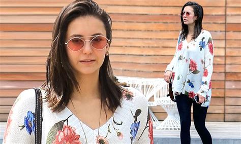 Nina Dobrev Puts On A Chic Display In A White Floral Print Jumper And