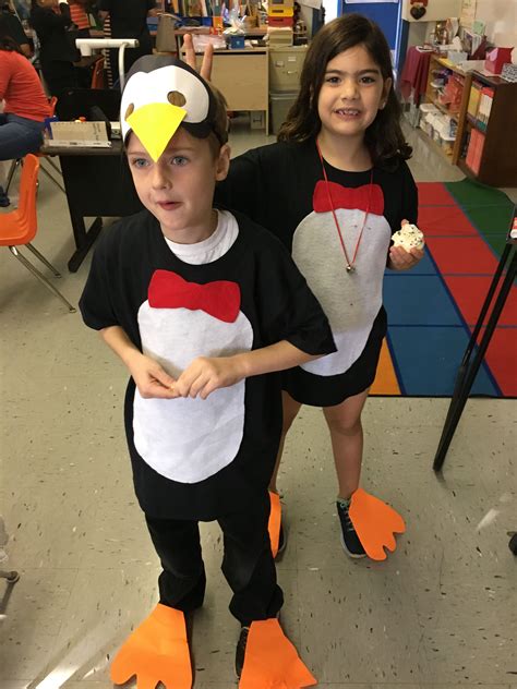 My 8 year old loves to play club penguin on the computer so she wanted a club penguin diy kids costume, her favorite one which is blue and white. Penguin tee shirt costume in 2019 | Diy penguin costume, Penguin halloween costume, Penguin costume