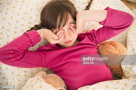 Kid Rubbing Eye Photos And Premium High Res Pictures Getty Images