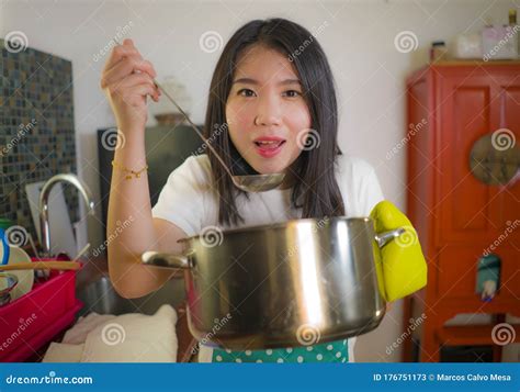Beautiful Domestic Chef At Work Lifestyle Portrait Of Young Pretty