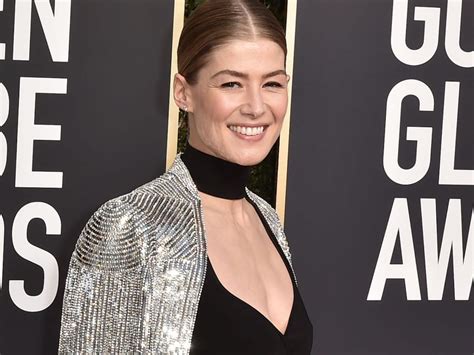 Rosamund Pike Buries Her Awards In Her Backyard Because She Feels