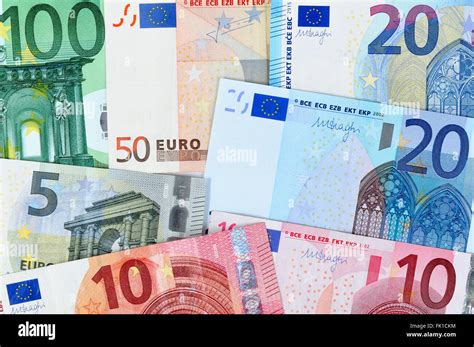 Image Of Various Denominations Of Banknotes And Coins Of Euro Currency
