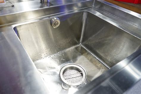 Soak a sponge or microfiber cloth in the paste to saturate it. How to Remove Chemical Stains from a Stainless Steel Sink ...