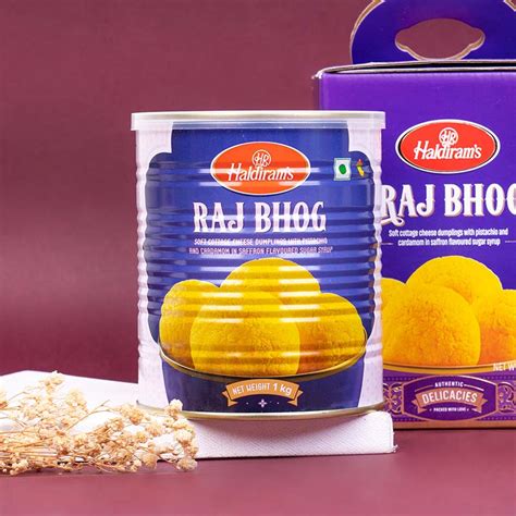 Send Bhaiya Bhabhi Rakhi With Haldiram Raj Bhog Online