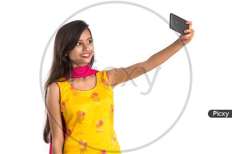 Image Of Beautiful Indian Girl Taking Selfie In Smart Phone Qo189571 Picxy