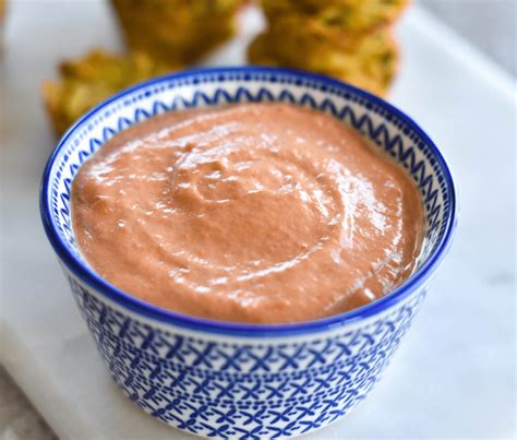 I've made salmon patties with almond flour but the cauliflower rice is a great idea! Keto Salmon Cakes with Tomato Aioli — Foodborne Wellness