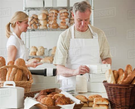 Bakers in a bakery - Stock Photo - Dissolve
