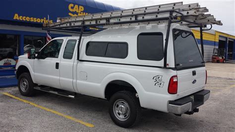 The truck cap rack carries up to 250 lbs and is a two section rack that rests on the truck bedrails without touching the top of the cap. Ladder Racks | Cap World