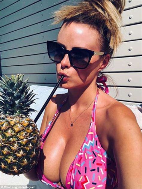 rhian sugden sets pulses racing as she flaunts her very ample assets in scanty