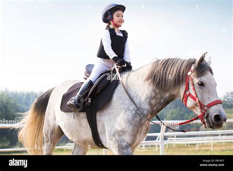 Chinese Girl Horse Riding On Hi Res Stock Photography And Images Alamy