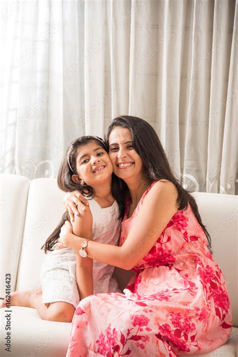 Indian Smart Mother Hugging Her Cute Daughter Portrait Of Happy Indian Mother And Daughter