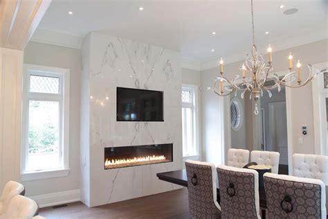 Therefore, a contemporary space needs a contemporary fireplace mantel that can turn anyone's head. Modern Marble Slab Dining Room Fireplace Surround | Dining room fireplace, Fireplace surrounds ...