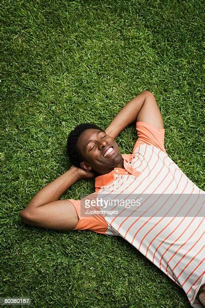 Black Man Sleeping Smiling Photos And Premium High Res Pictures Getty