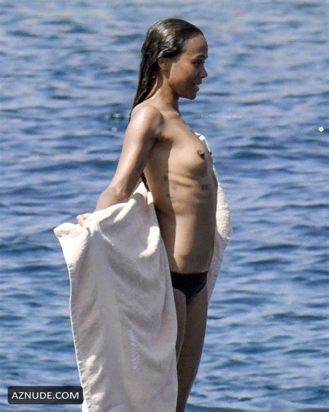 zoe saldana sexy shows her nude tits in sardinia aznude