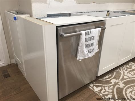 So what the heck do you do when you build a kitchen, and there just isn't enough space to add another cabinet on the other side of the dishwasher? Creating a wrap-around cabinet & moving the dishwasher ...