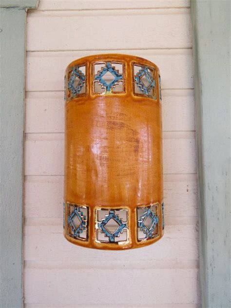 The ziggurat outdoor wall light features a ribbed ceramic design that, when illuminated, offers an inviting warm on your porch, patio or deck. Pin on Custom Cut Lighting